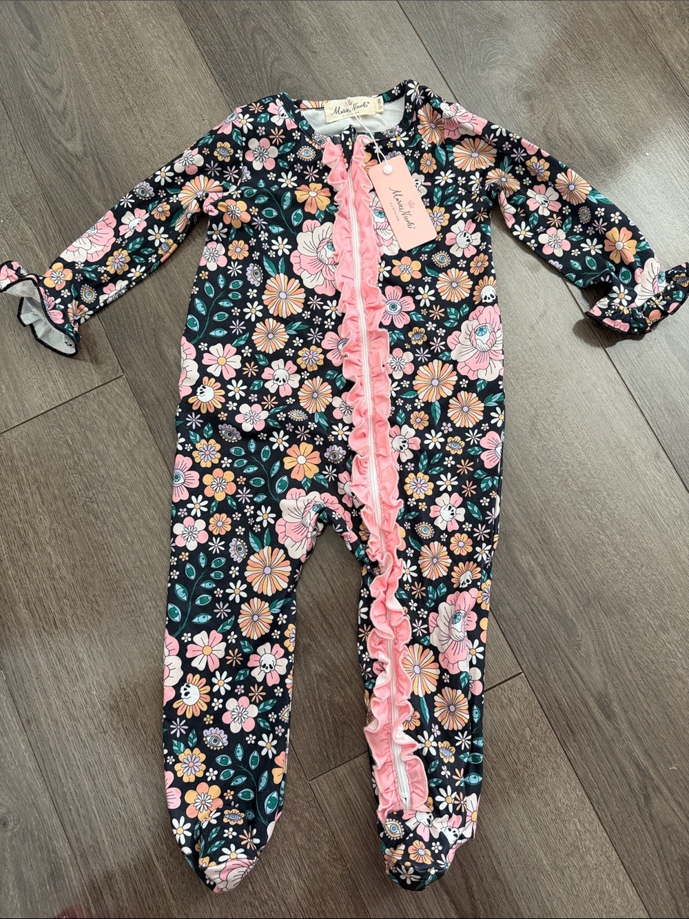 NWT Marie Nicole Clothing Black Floral Ruffle Footed One-Piece